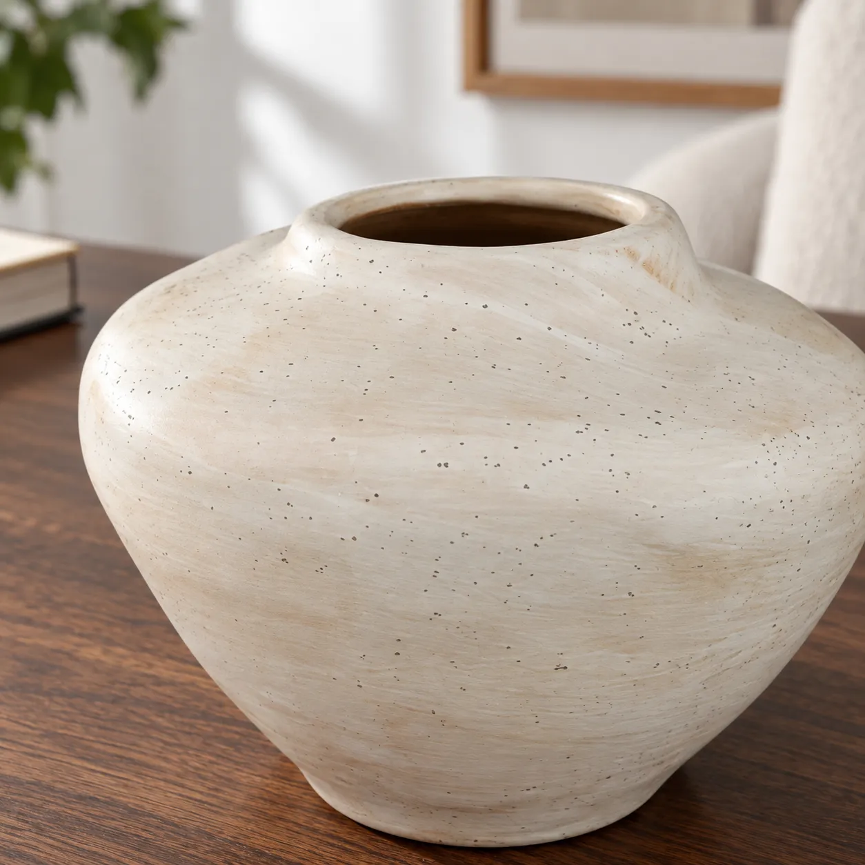 Close view of the low rim and fine speckled ceramic finish
